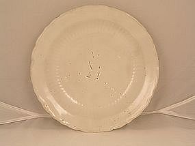 Fine Wanli period white glazed barbed plate, Sotheby's