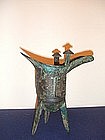 VERY RARE AND FINE LATE SHANG DYNASTY TAOTIE BRONZE JUE