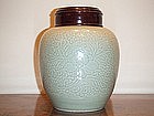 FINE AND RARE KANGXI PERIOD CARVED CELADON OVOID JAR