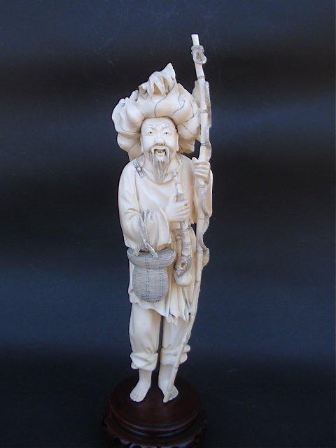 Chinese Ivory carved figure of a fisherman