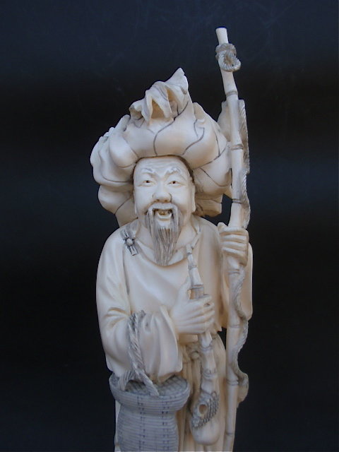 Chinese Ivory carved figure of a fisherman