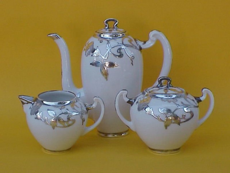 Sterling silver overlay porcelain tea service