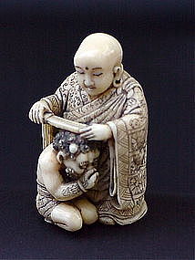 Japanese Ivory Netsuke Buddha and Oni artist signed