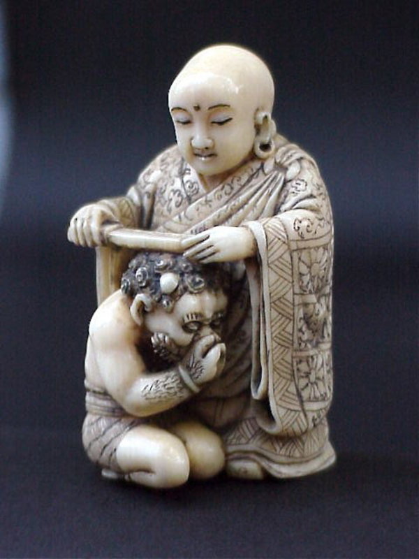 Japanese Ivory Netsuke Buddha and Oni artist signed