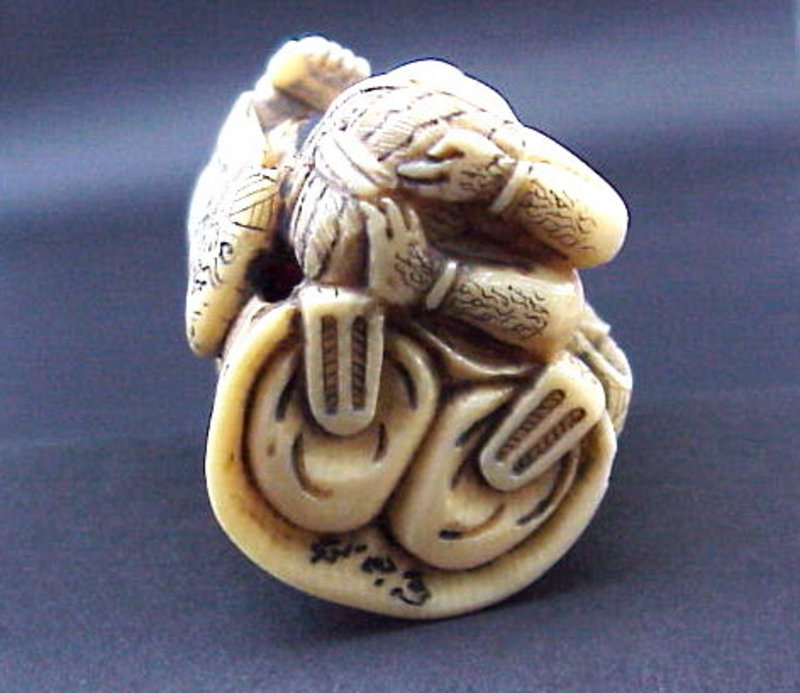 Japanese Ivory Netsuke Buddha and Oni artist signed