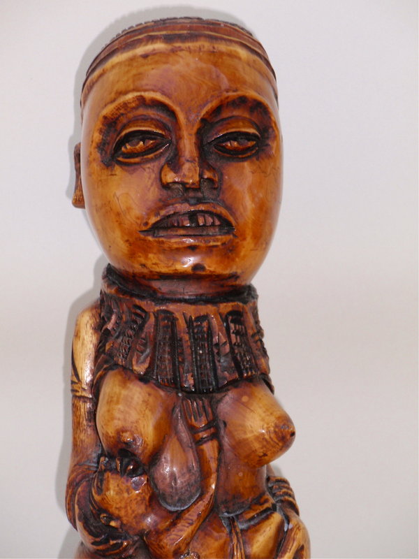 African art Carved Ivory Statue nursing female