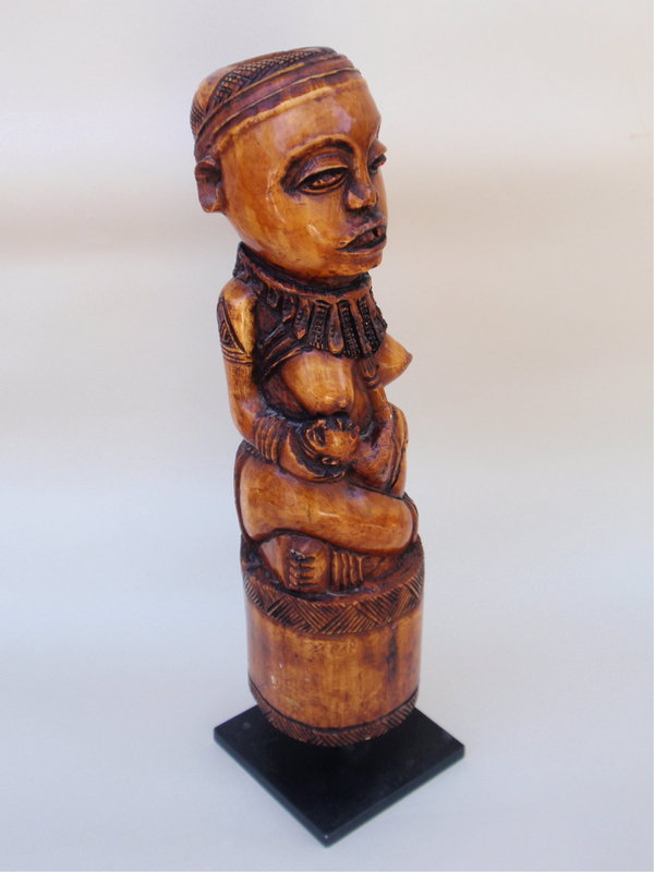 African art Carved Ivory Statue nursing female