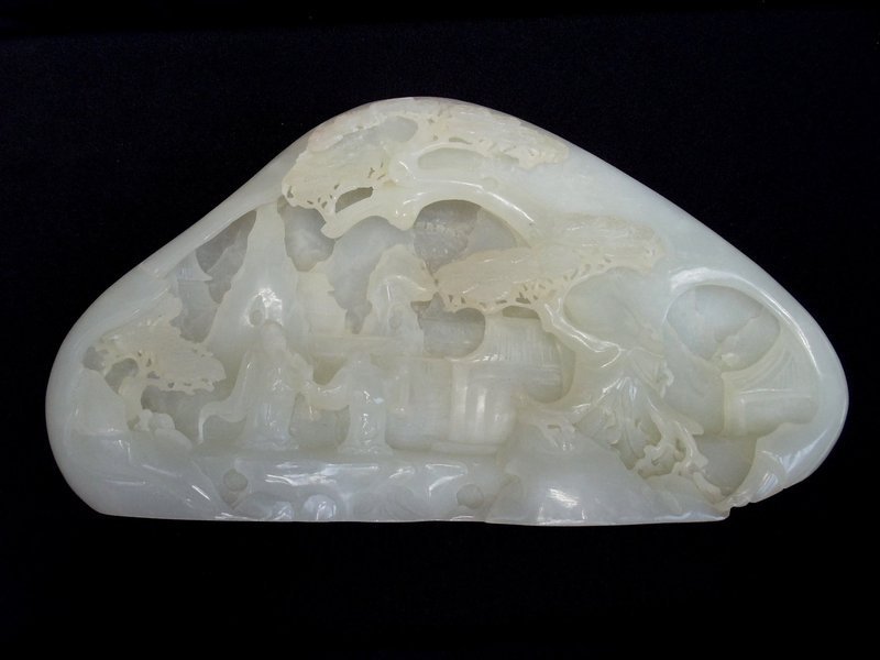 An Exquisite White Jade Boulder of Scholars in a Garden