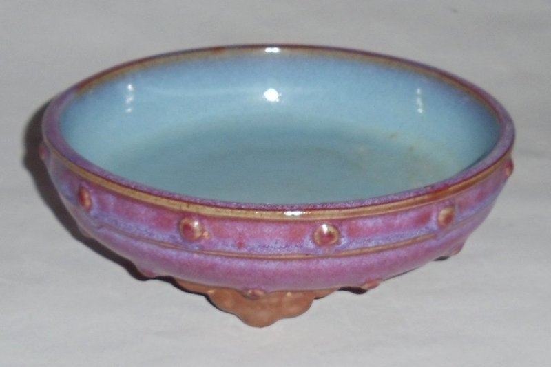 A Rare Rosy Glazed Junyao Washer with Drum-Stud Motifs and Ruyi Legs