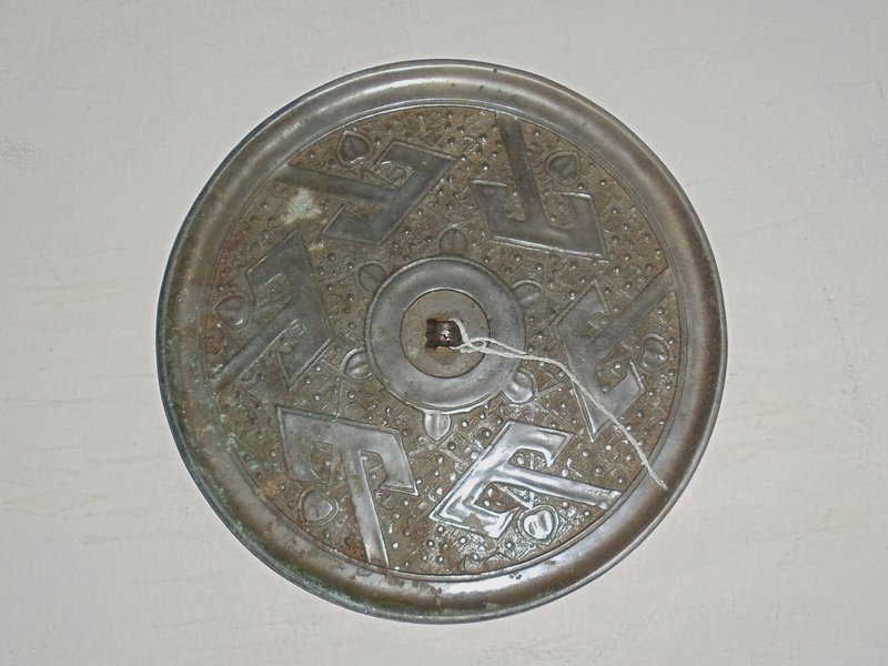 A Rare Tang Dynasty Bronze Mirror with Archaic Shanzi Motifs