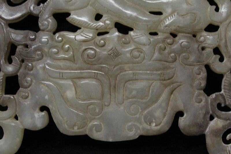 A-Rare-amp-Exquisite-White-Jade-Bi with-Motifs-of-Imperial-Symbols-Zh
