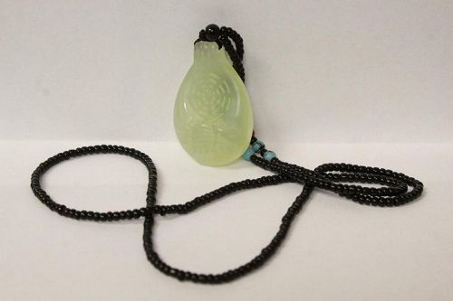 A Rare & Exquisite Jade/Jadeite Pendant with a Long Bead Necklace