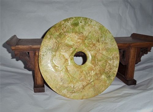 A Rare Majestic Jade Disc with Archaic Dragon-Kilin Relief-Motifs