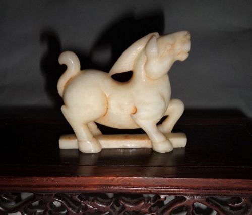 A Rare and Exquisite Hetian White Jade Carved Supernatural Qili