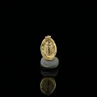 Scarab with original gold ring 1,0 cm.