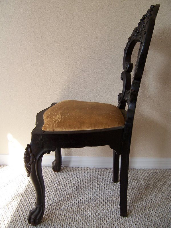 A Good Pair of Carved Black Walnut Chairs, 19th century
