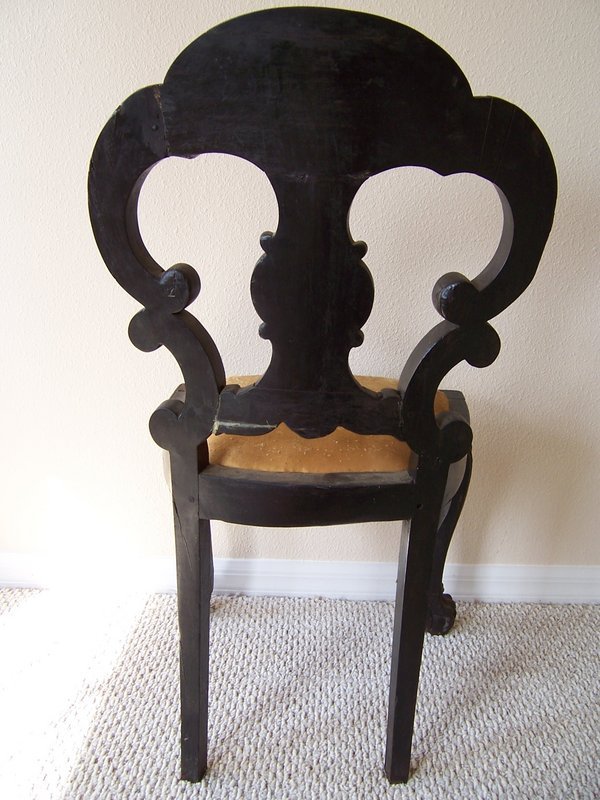 A Good Pair of Carved Black Walnut Chairs, 19th century