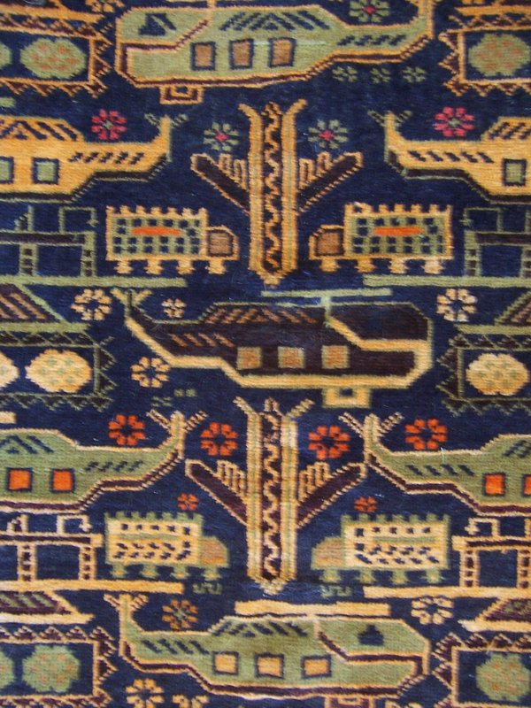 An Afghani Hand-Made Rug with American Military Motifs