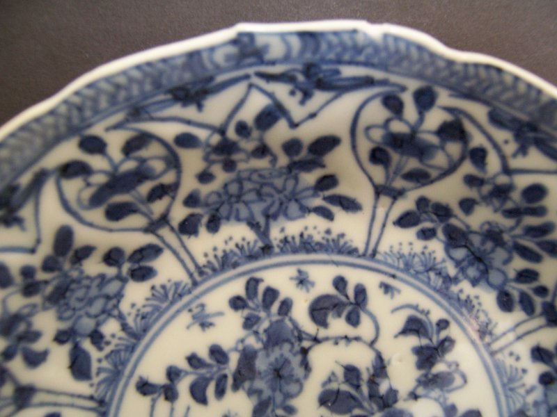 A Blue and White Teacup and Saucer, Kangxi-Yongzheng