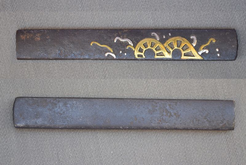 Kozuka  iron with paddle wheels in brass and silver.