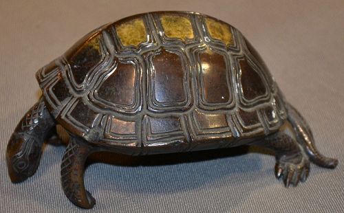 Partially gilded bronze turtle.