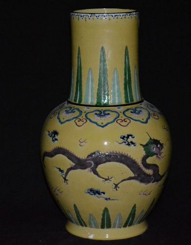 Chinese porcelain vase enameled with dragons and clouds (Broken)