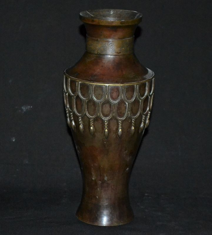 Cast bronze vase inlay with gold and silver.
