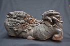 Pair of Buddhist Lions in carved wood.