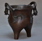 Cast bronze censer in three peaches forme, dragons handle.
