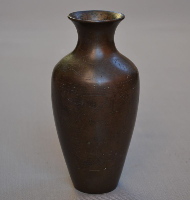 Chinese bronze vase inlaid with silver wires.