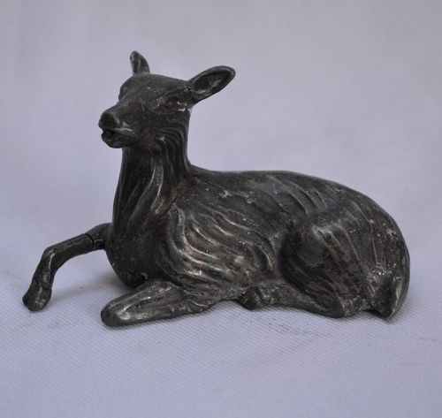 Cast pewter dropper in the shape of a doe