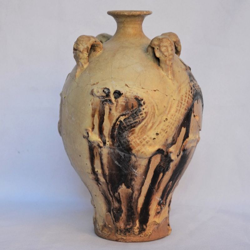 Sandstone vase decorated with a dragon