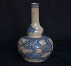 Porcelain vase with dragon decoration in cobalt blue. Vietnam 19th