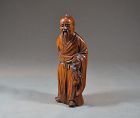 Statuette of Shoulao carved in boxwood. China Qing period.