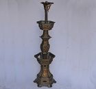 Large temple candlestick in gilded lead. China, Qing period.