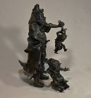 Shoki(Chang Kuo)and demons in bronze stained with gold. Edo Japan.