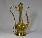 Gilded cast bronze ewer. China 17th century.