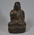 Carved black stone Buddha. Medieval India, Pala period, 11th century.