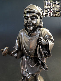 Fine silver image depicting Daikoku-ten. Takamura Koun