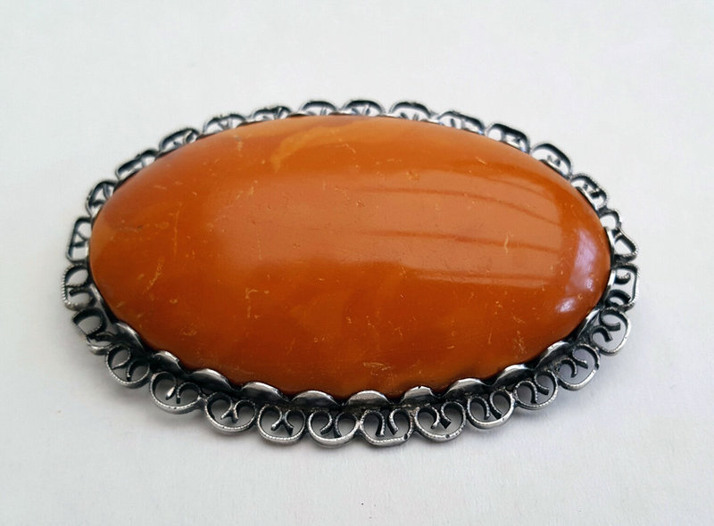 Great Large Antique Brooch of Amber with Silver mounting. 15 gr.