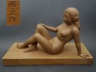Japanese vintage wood sculpture of a young woman, made by Shoji