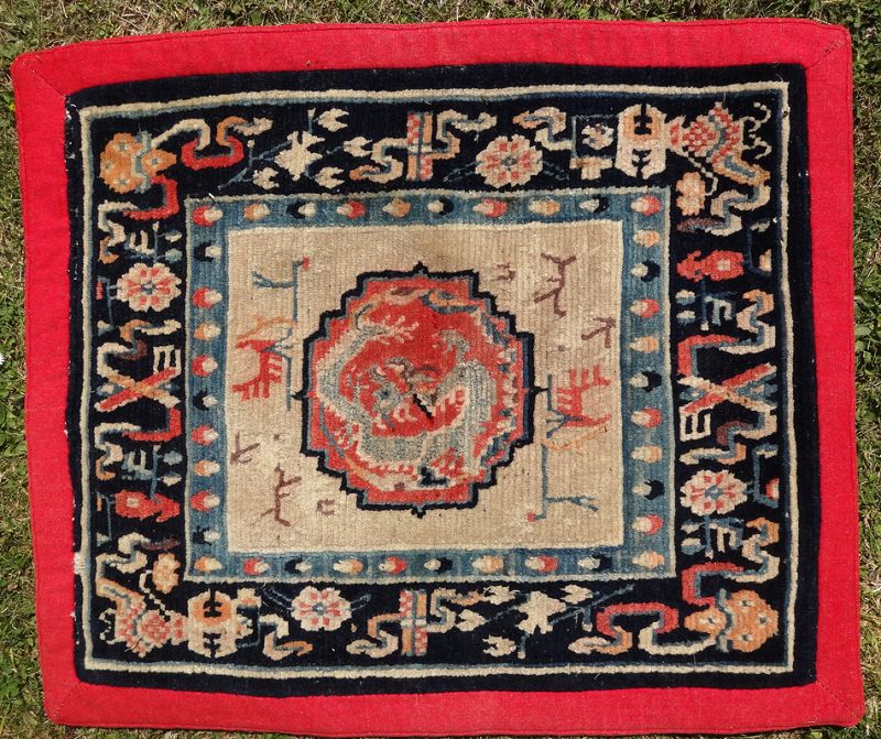 Antique Tibetan Meditation Rug with Dragon and Buddhist Symbols