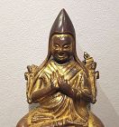 Tibetan fire gilt bronze image of Tsongkapa, Gelugpa Founder