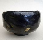 A well potted Black  Raku Chawan