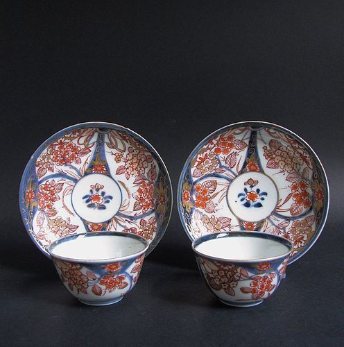 A pair of Imari Hydrangea pattern Tea bowls and Saucers Early 18th C.