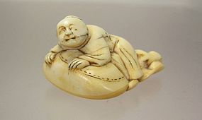 18th C. Japanese Netsuke:  Monk atop Bag of Treasures