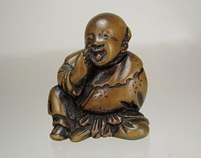 19th Century Japanese Boxwood Netsuke: Karako Playing Bekkanko