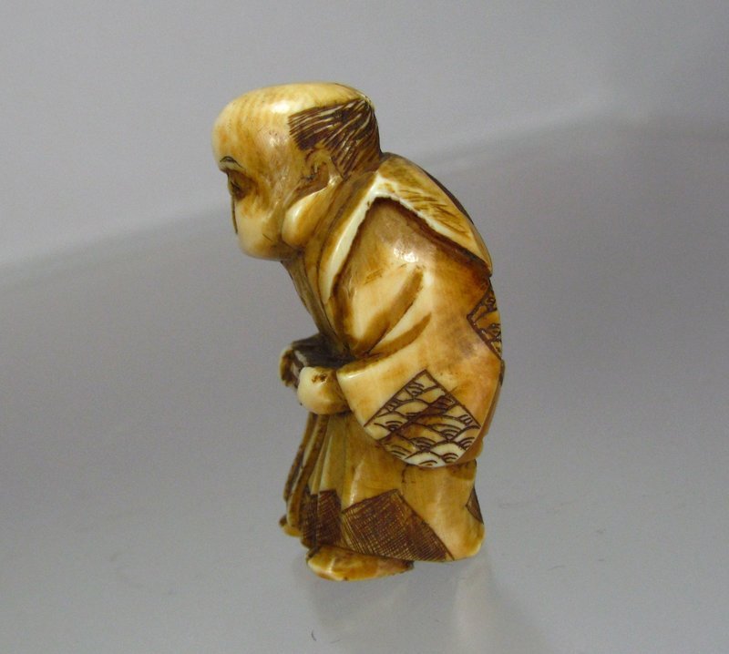 19th Century Japanese Netsuke:  Samurai Holding Box