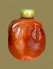 Late Qing Dynasty - A Carnelian Leaves and Tendrils Snuff Bottle