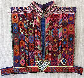 A child's vest from Afghanistan in cross stitch